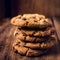 Chocolate cookies on wooden table. Stacked Chocolate chip cookie