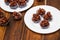 Chocolate cornflake cookies served on white plates