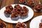 Chocolate cornflake cookies served on white plates