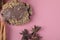 Chocolate crocante cookies with nuts on a pink background