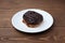 chocolate croissant bread danish on plate on wooden table