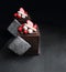 Chocolate cube desserts with dried strawberry and meringue