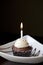 Chocolate Cupcake with a Burning Birthday Candle