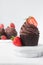 Chocolate cupcake with dark chocolate buttercream and strawberries, double chocolate cupcakes with american buttercream