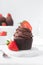 Chocolate cupcake with dark chocolate buttercream and strawberries, double chocolate cupcakes with american buttercream