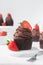 Chocolate cupcake with dark chocolate buttercream and strawberries, double chocolate cupcakes with american buttercream