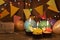 Chocolate cupcakes with candles against festive background