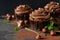 Chocolate cupcakes with peanut paste the old background