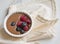 Chocolate dessert with berries on the background of a beautiful beige napkin