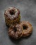 Chocolate donuts on dark. Delicious desserts