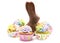 Chocolate Easter Bunny and Cupcakes on a White Background