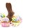 Chocolate Easter Bunny and Cupcakes on a White Background