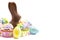 Chocolate Easter Bunny and Cupcakes on a White Background