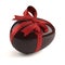 Chocolate easter egg with red ribbon