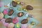 Chocolate Easter eggs and iced decorations on a table with overhead view