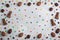 Chocolate easter eggs, rabbits, casks and sweets pattern on concrete background