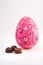 Chocolate egg with coloured sugar decoration