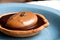 Chocolate expresso tart on a blue plate