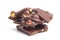 Chocolate with filberts piles on whitÐµ. Sweet food object photo