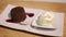 Chocolate fondant served with sweet berry sauce and ice-cream