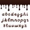 Chocolate font with latin letters. Melted chocolate alphabet with liquid letters