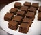 Chocolate gingerbread squares on the plate