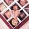 Chocolate heart and collection luxury chocolate candies in a gift box