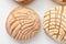 Chocolate Homemade Mexican Conchas. A traditional Mexican sweet bread roll. Round shape and their striped, seashell-like