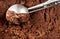 Chocolate  ice cream scoop.  Dark cocoa Ice-cream Background or Texture. Top view