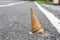 Chocolate icecream cone dropped on the concrete floor