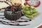 chocolate lava cake set served with ice cream vanila,wiped and m