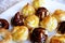 Chocolate and lemon-vanilla profiteroles