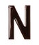 Chocolate letter N on white background