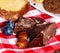 Chocolate lump with blueberry biscuit and cookie on picnic
