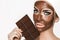 Chocolate Luxury Spa. Woman with Facial Mask .Chocolate Mask Facial Spa
