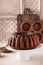 Chocolate marble bundt cake with chocolate glaze drizzled on top