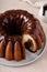 Chocolate marble bundt cake with chocolate glaze drizzled on top