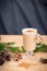 Chocolate Martini Cocktail or eggnog with cinnamon and chocolate in glass for Christmas on mahogany background