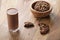 Chocolate milk in glass with homemade chocolate cookies with hazelnuts