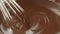 Chocolate. Mixing melted liquid premium dark chocolate with a whisk. liquid hot chocolate swirl. Chef prepares dessert, sauce.