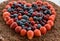 Chocolate mousse cake with organic berries from our garden