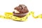 Chocolate muffin wrapped in a tape measure