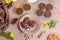 Chocolate muffins on a beige background, top view, flat lay. Homemade Baking