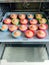 Chocolate muffins in colorful silicone molds on baking sheets