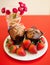 Chocolate muffins with strawberries