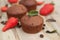 Chocolate Muffins with Strawberry Mint Leaves over rustic Gray Background Breakfast desert