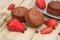 Chocolate Muffins with Strawberry Mint Leaves over rustic Gray Background Breakfast desert