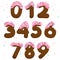 Chocolate numbers with pink frosting and colorful sprinkles. Vector illustration