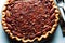 Chocolate nutty caramel pecan pie traditional American treat for holidays