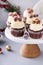 Chocolate orange Christmas cupcakes with cream cheese frosting with sugared cranberries